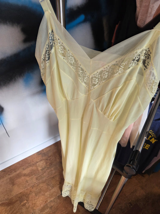 Vintage soft yellow knee length slip